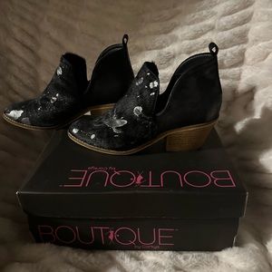 Ladies short bootie, Leather with hair on and metallic enhancements.